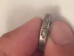 What-Are-The-Marks-On-The-Side-Of-This-Coin?